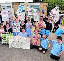 Children at St Mary's Primary School, unhappy about phone mast