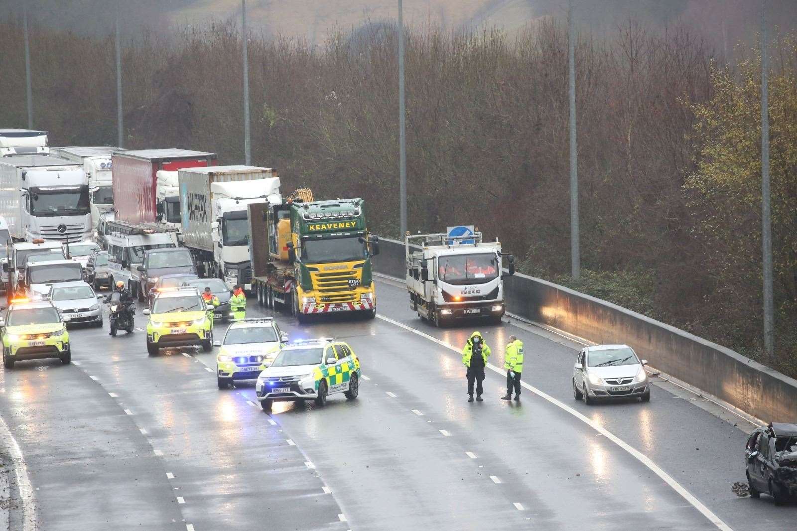 Emergency services have been called after a car overturned on the M2 near Chatham. Picture: UKNIP