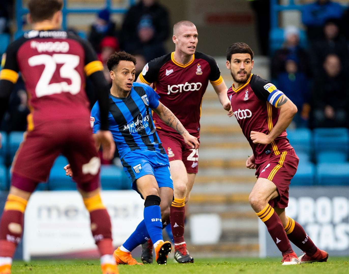 Elliott List watches his shot go in for Gillingham's third goal against Bradford City Picture: Ady Kerry