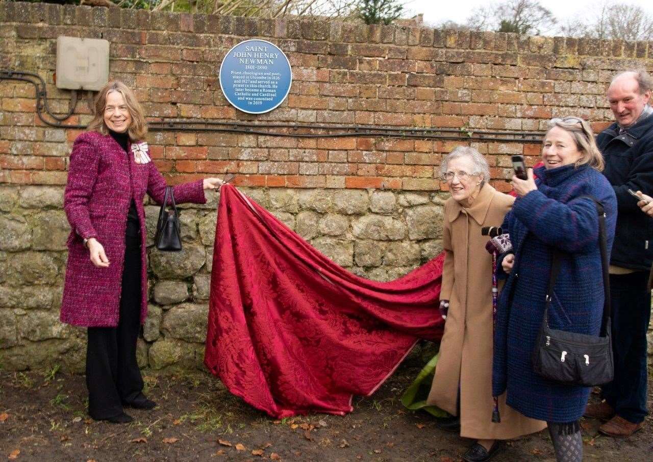 Lady Colgrain and Molly Poulter unveil a plaque in Ulcombe to the memory of Saint John Henry Newman