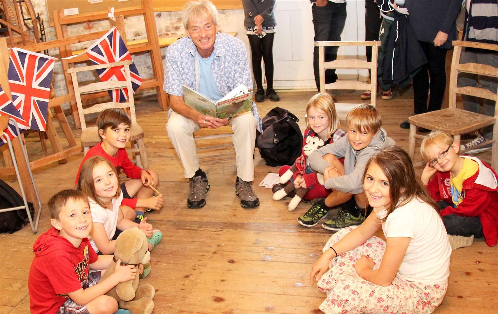 Poet John Rice with children in Cranbrook's Union Windmill at the last event