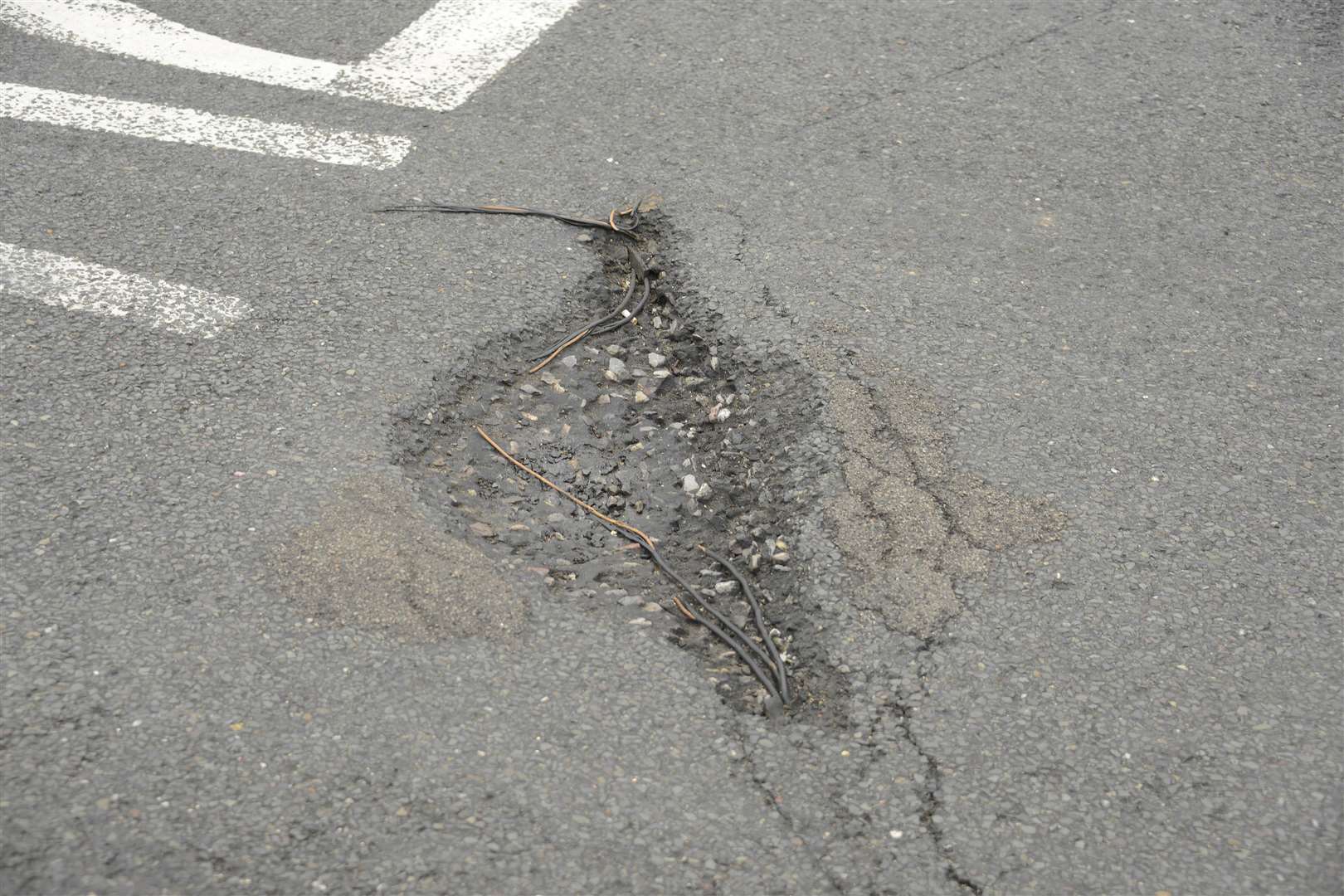The road over the M2 and Thanet way is full of deep Potholes.Picture: Paul Amos.