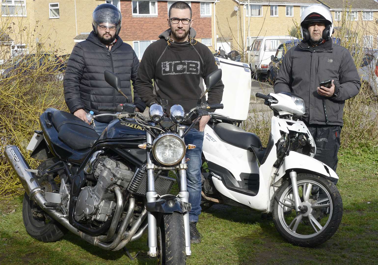 Mauro Borges with his two stolen bikes and fellow bikers Emmerson Machado and Rodlfo Ribeiro, who also had motorcycles stolen