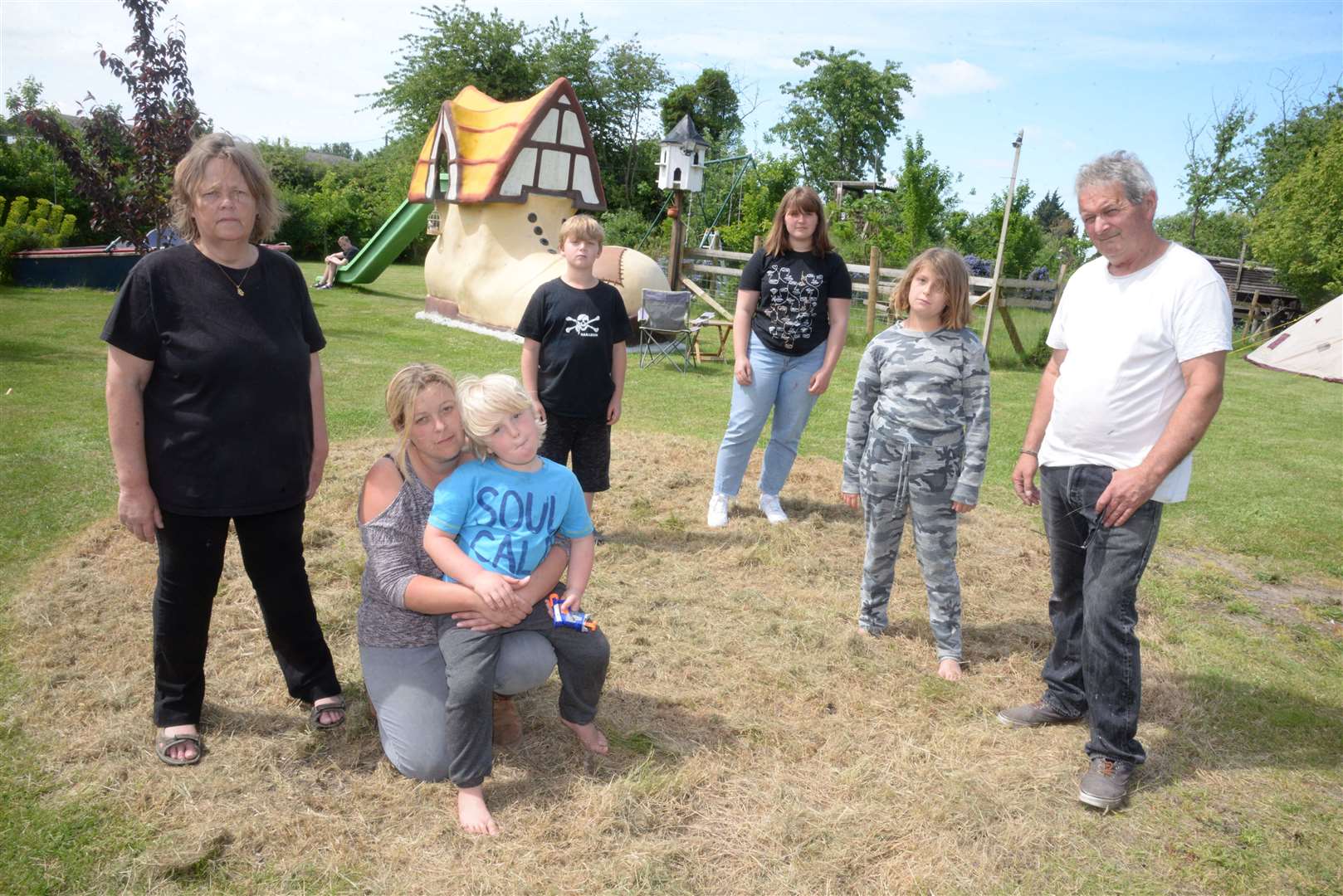 Becky, left and David Foulcer, right with daughter Vicky, Noah, Isaac, Lilly and Daisy, where the trampoline once stood