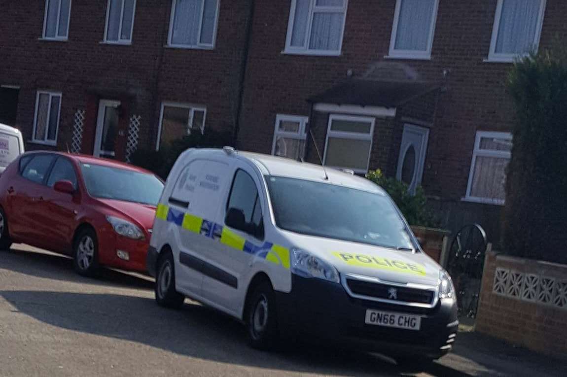 Marked cars outside the home in Kingsnorth Road, Twydall