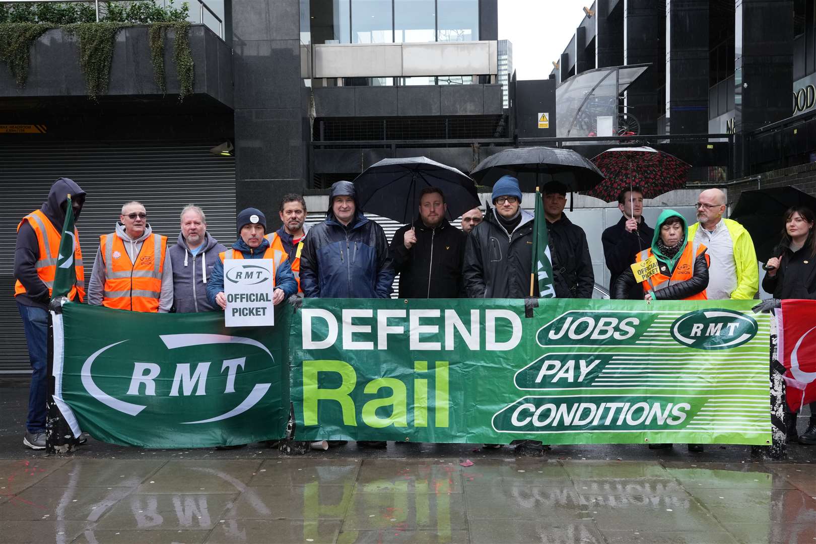 Mick Lynch (sixth left blue jacket), on the picket line outside Euston station on Saturday (Jeff Moore/PA)