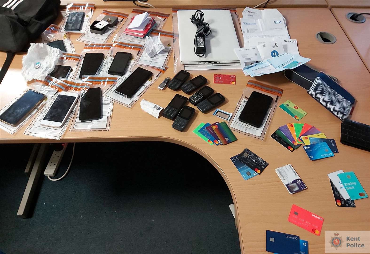 Cards and phones seized on site. Picture: Kent Police