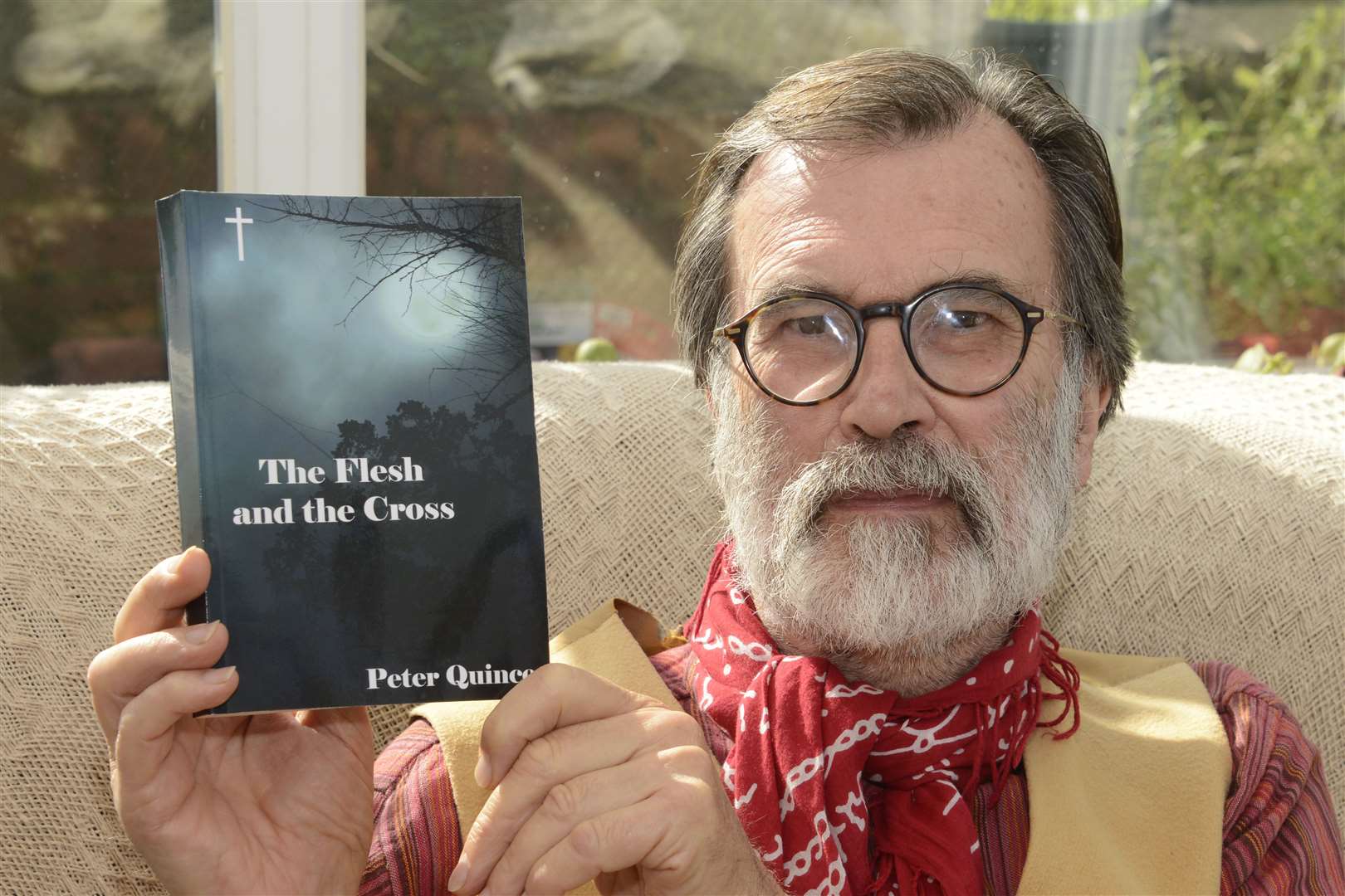 Faversham author Peter Quince and his latest novel. Picture: Paul Amos