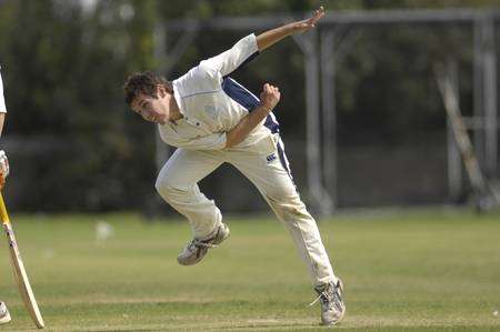 Cricketer Michael Ross bowling for Broadstairs against Folkestone in July 2011