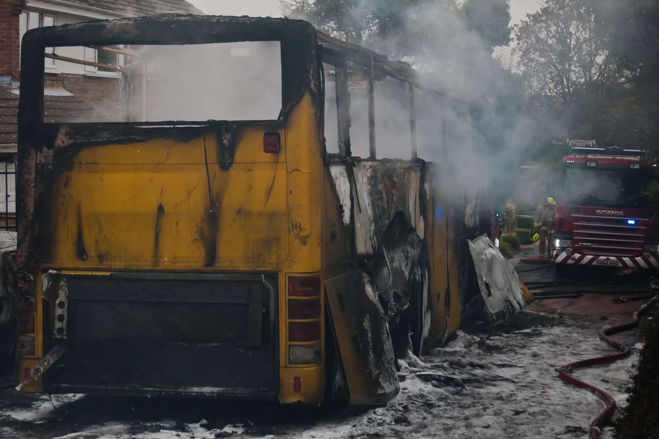 School children fled this coach in Platts Heath moments before it burst into flames. Picture: Andy Flood