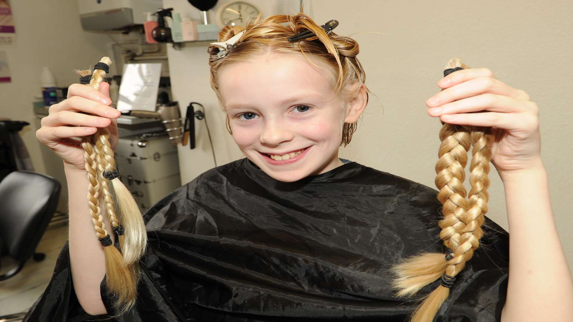 Isabel Christian had her long hair cut off to raise money for Medway Street Angels