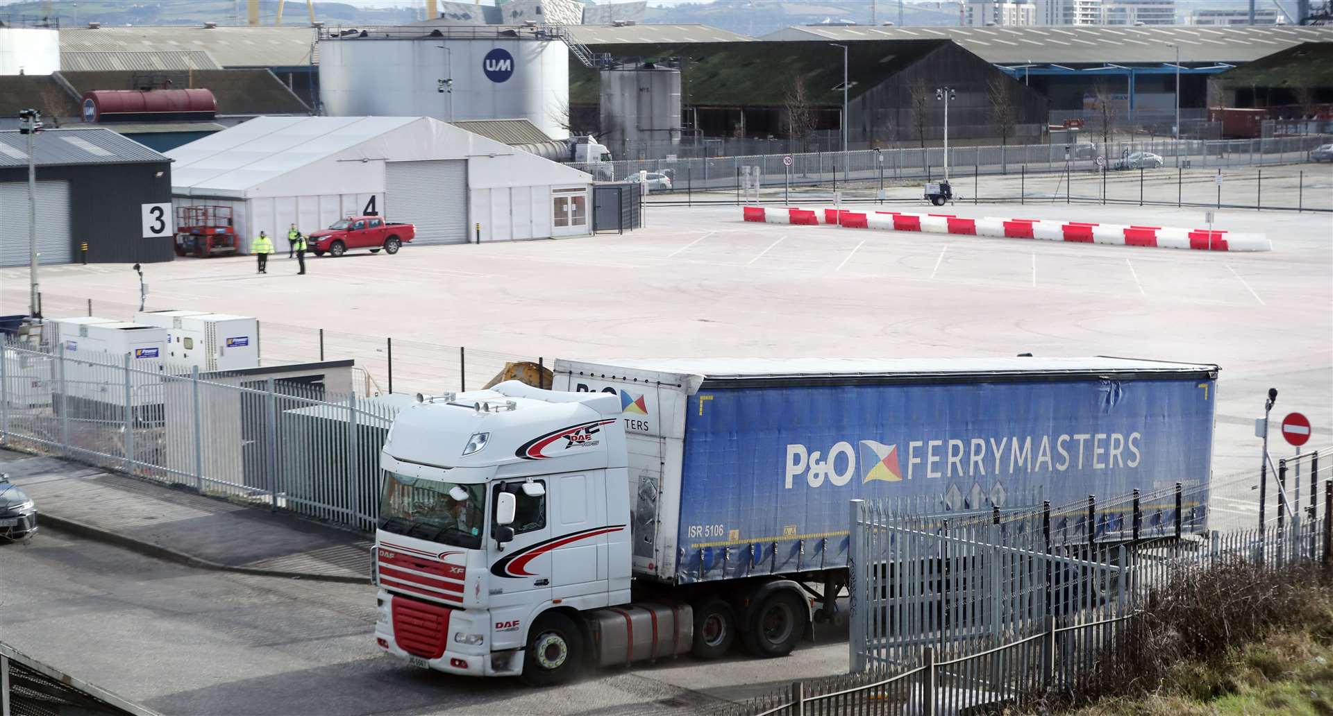 A lorry leaves a Brexit checking facility at Belfast Port (Niall Carson/PA)