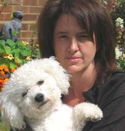 Diane Young with Casper who was almost savaged to death. Picture: DAN IRWIN
