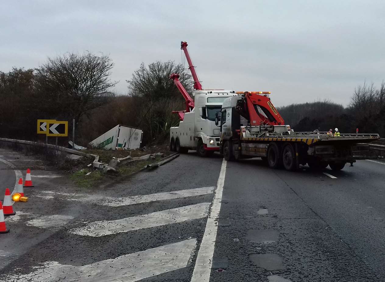 Cranes are being used to recover the lorry. Picture: Highways England