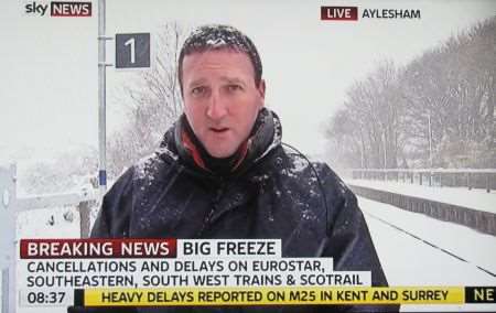Sky News reporter Paul Harrison at a snow swept Aylesham railway station on Thursday morning