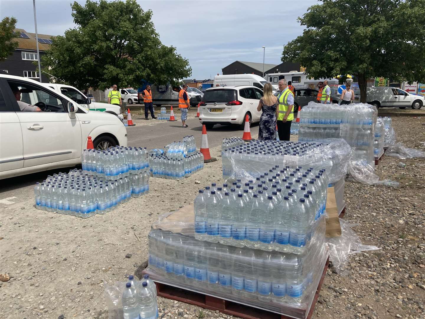 Supplies of free water bottles being handed out from a Leysdown car park