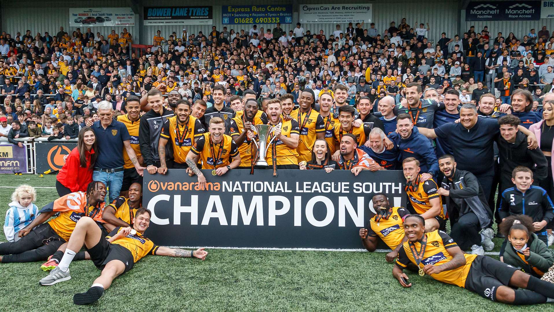 Kent rivals Maidstone United celebrate promotion last season - they now play their football one division below the Gills. Picture: Helen Cooper