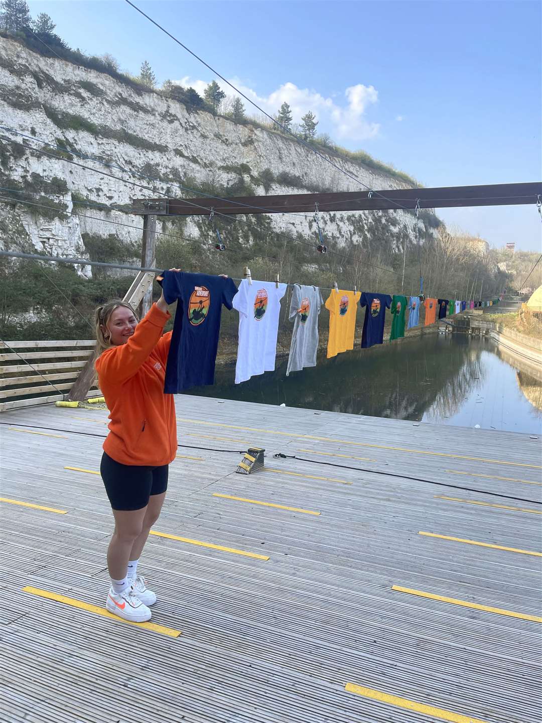 Alison Fogall-Hooper, apparently pegging the final T-shirts on the 'record breaking washing line', on the morning of April Fool's Day