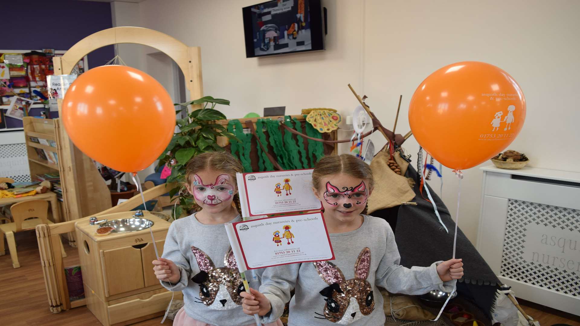 Charlotte and Chloe Spicer celebrate the opening of the new buildings. Picture: Asquith Day Nurseries