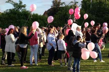 Family and friends of Ben Simmonds release balloons in his favourite colours