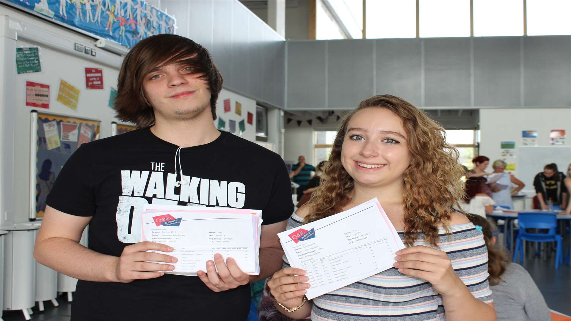 Alex Forster and Holly Neal with their A level results