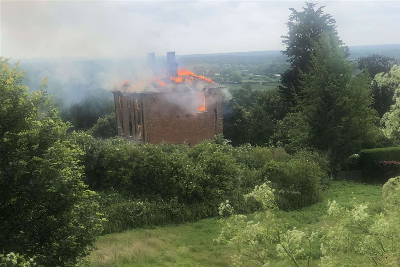 The house on fire in Sutton Valence. Picture Carole Sinclair-Smith