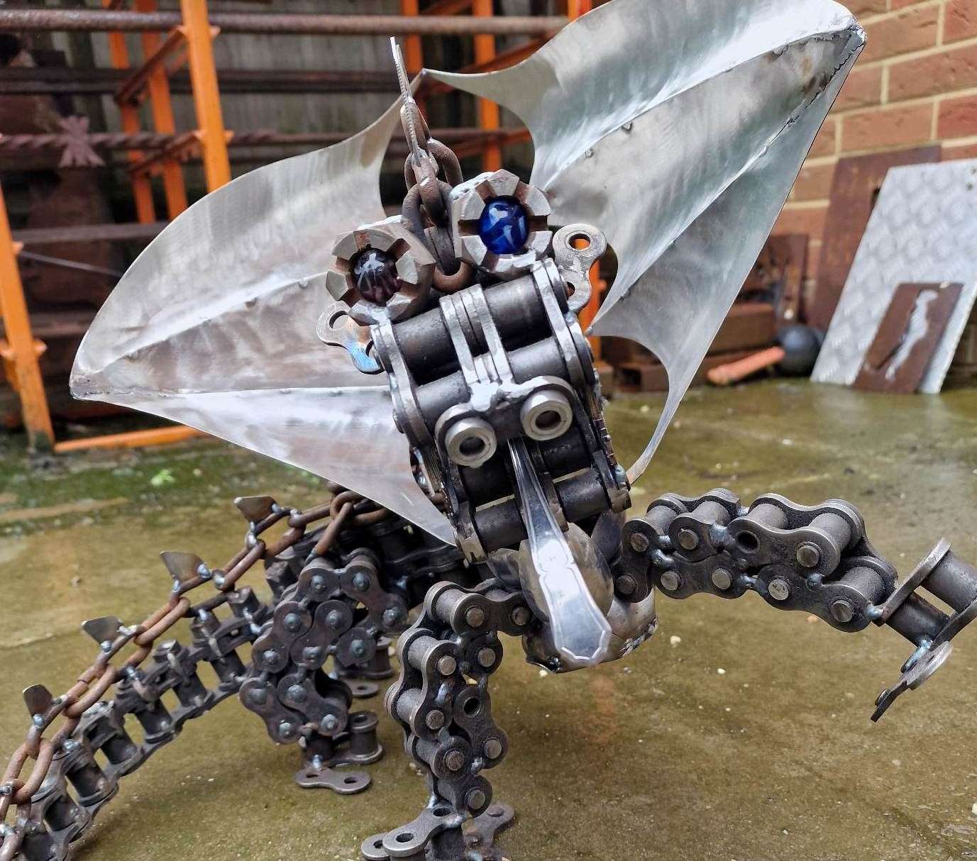 Mr Allcorn made this dragon sculpture out of odd bits and bobs. Picture: Jon Allcorn