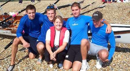The Dover Rowing Club members who became the youngest ever crew to row across the Channel. Left to right Matt Prosser, James Downer,cox Charlotte Bailey, Mark Simmons and Jim Seath with their boat called Archers Court School.. Picture: GRAHAM TUTTHILL