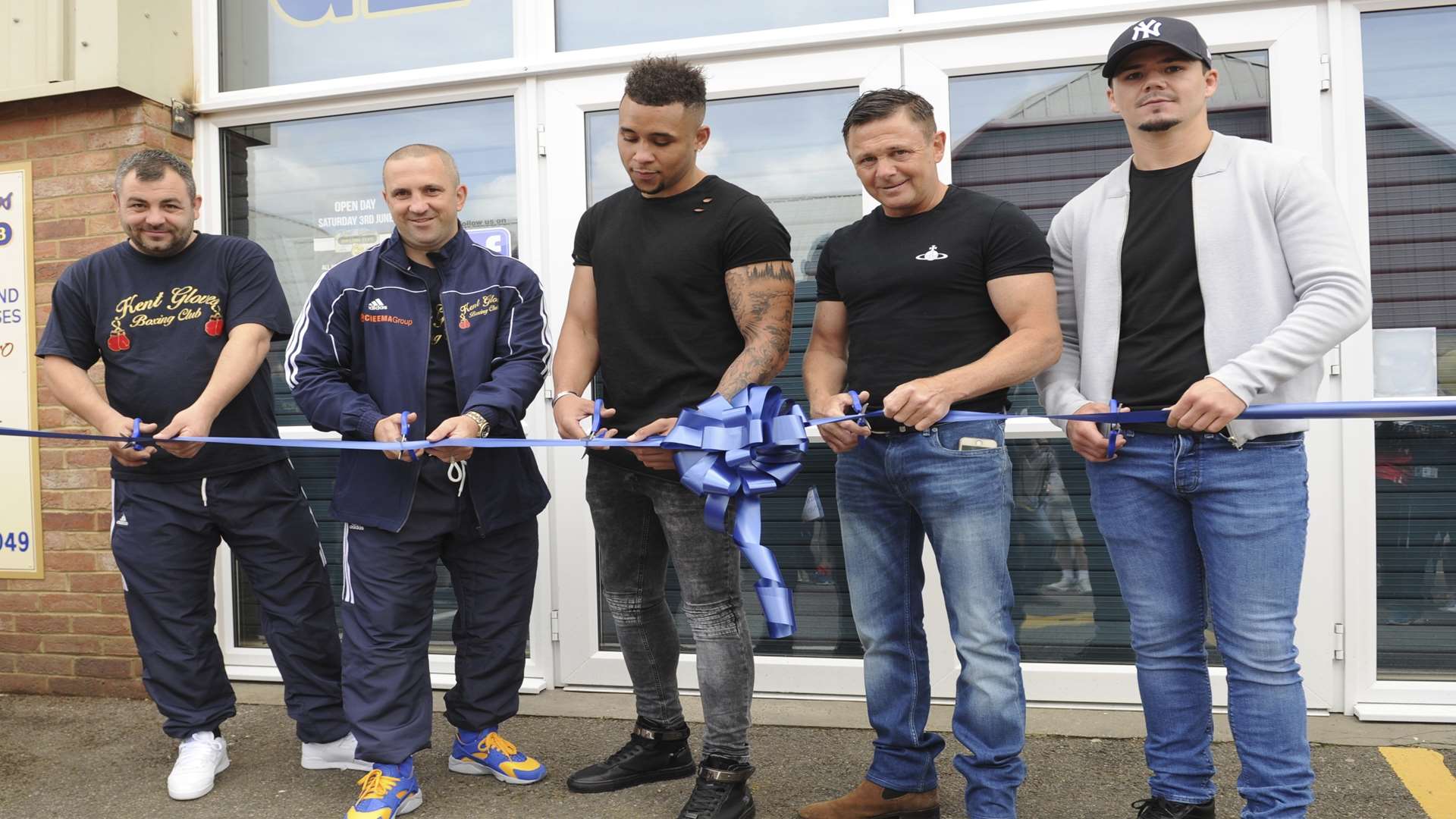 Cutting the ribbon to open the new gym are, from left, David Shepard, Charlie Rumbol, Grant Dennis, Johnny Armour and Johnny Coyle Picture: Steve Crispe
