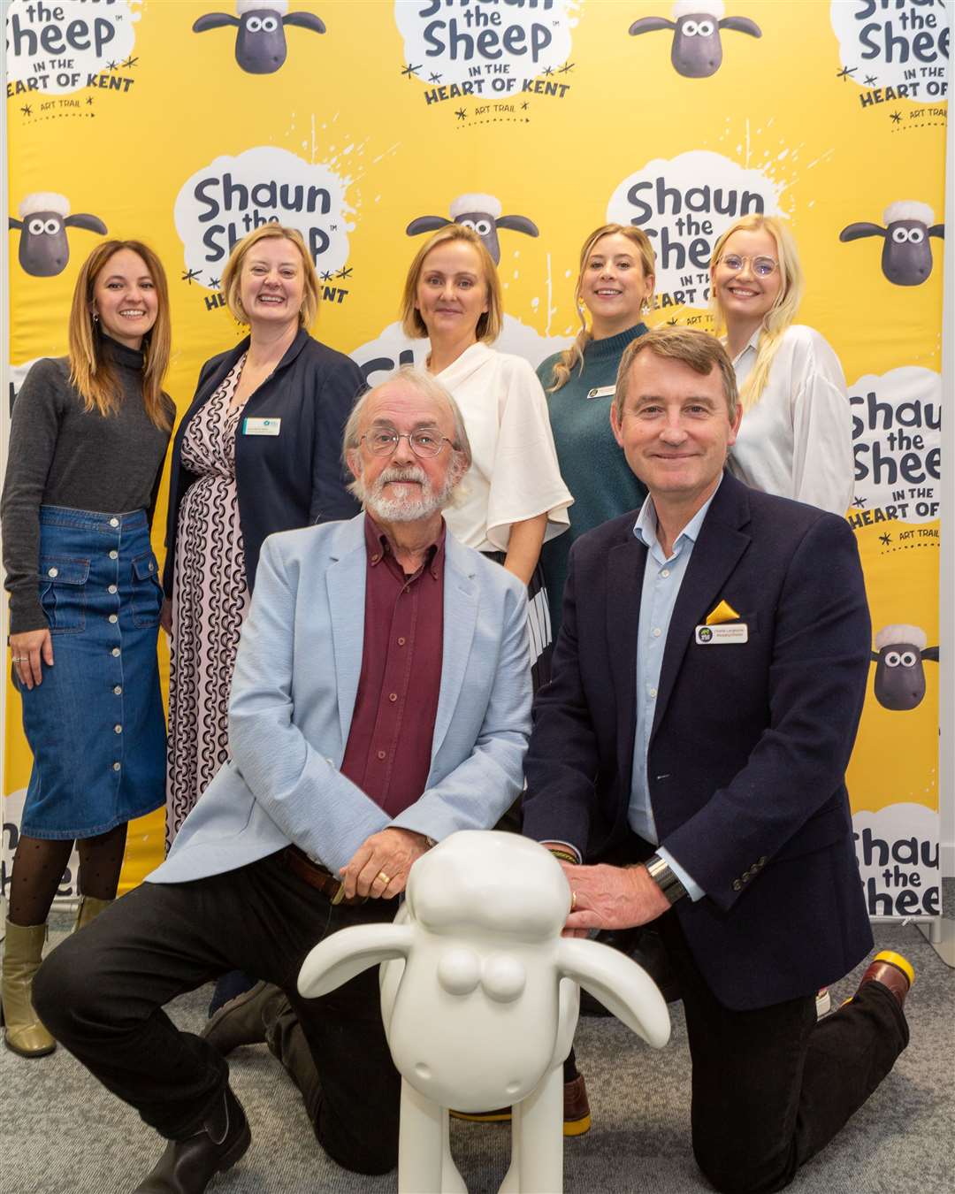Organisers of the art trail with a Shaun sculpture