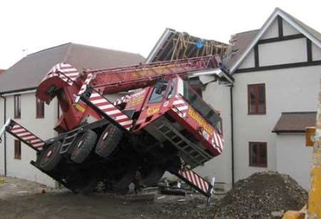 CHAOTIC SCENE: The crane ploughed through the house from back to front. Picture: PETER BARNETT