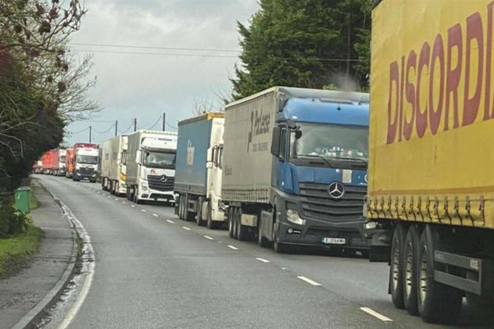 Lorries queueing on the A20 in Sellindge. Picture: Beau Goodwin