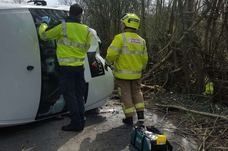 Fire crews and paramedics at the scene of the A28 crash. Picture: John Pyne