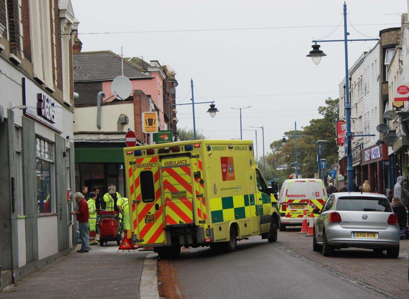 Susan Bidgood being taken away by ambulance after slipping on oil in Sheerness High Street