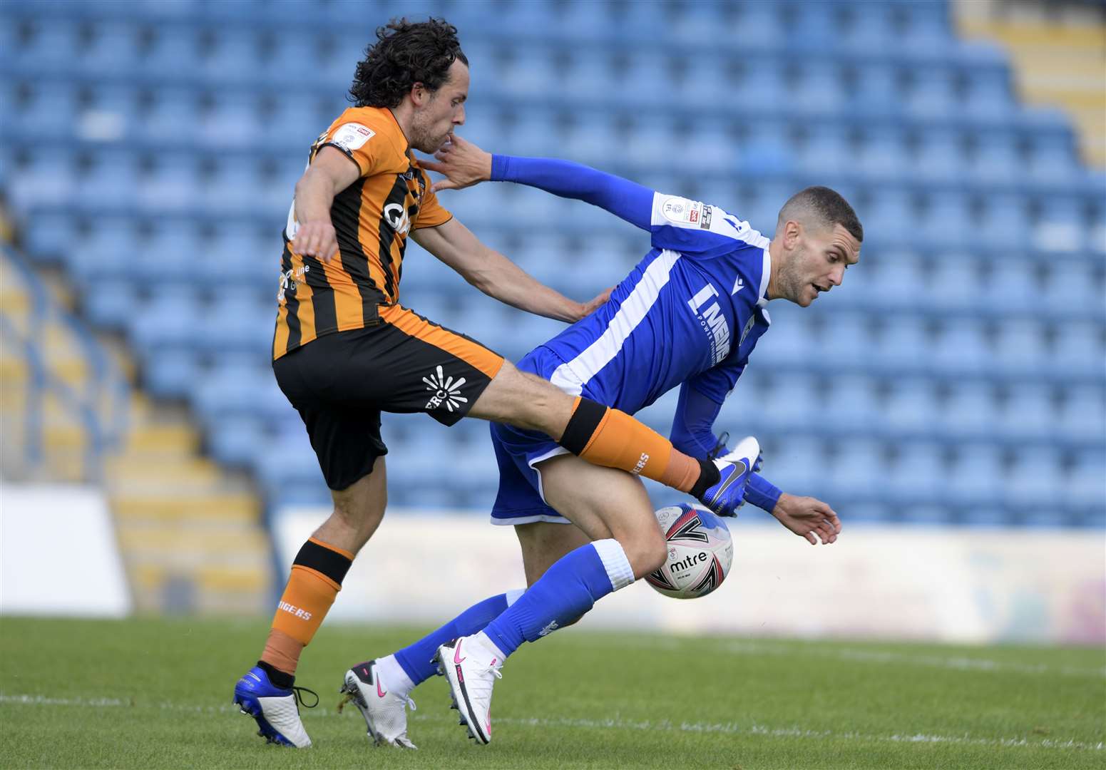 Gillingham's Stuart O'Keefe battles for the ball against Hull on the first day of last season. Picture: Barry Goodwin