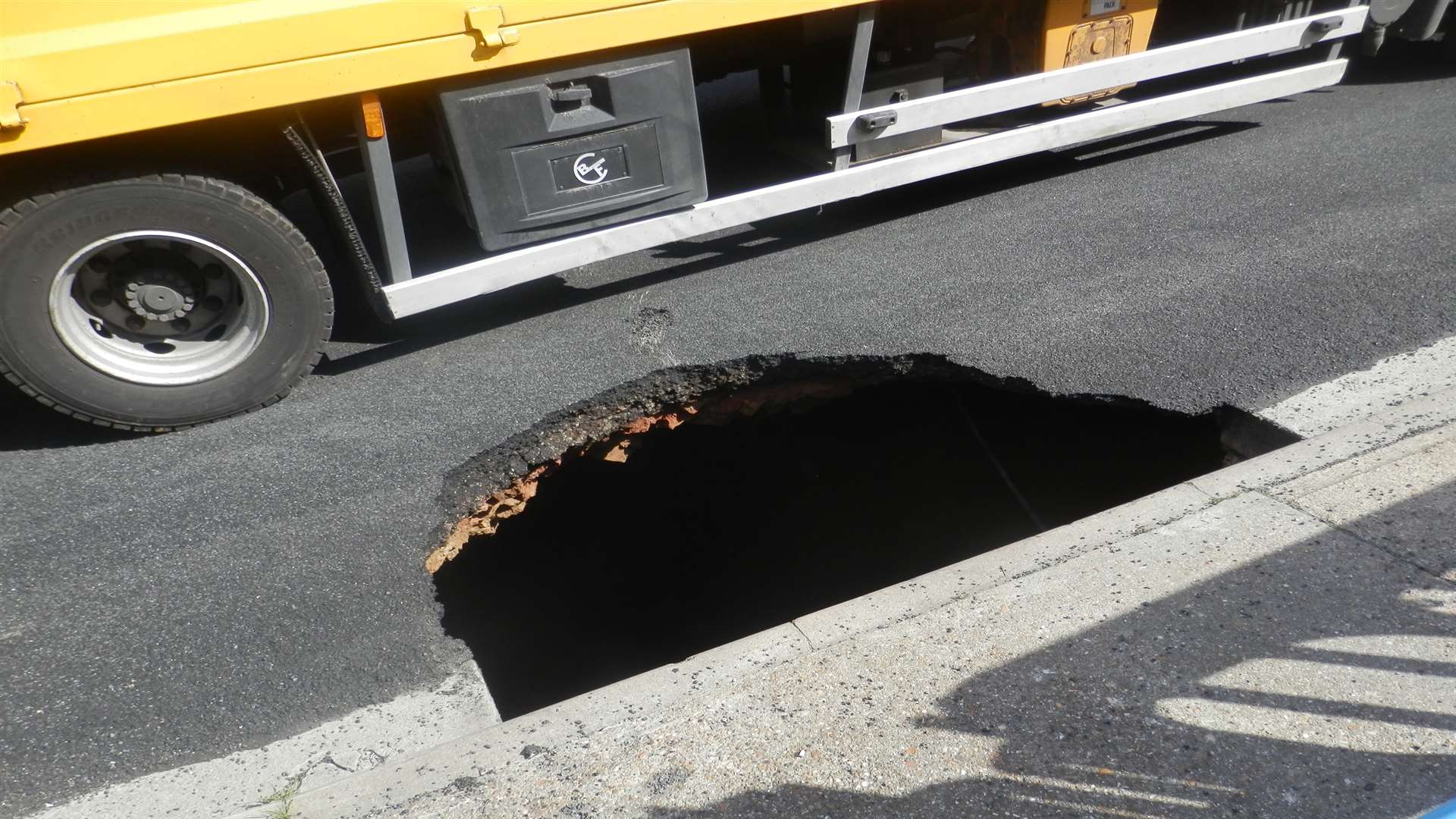 The hole is so deep it could fit four cars inside it. Picture: Nicole Xhepa