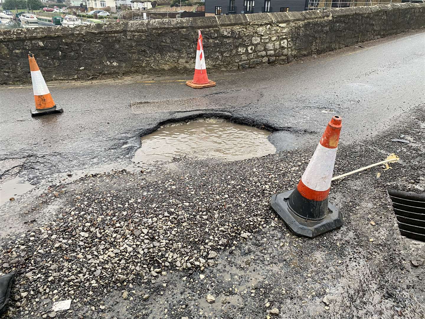 Huge pothole just before the East Farleigh Bridge in Maidstone