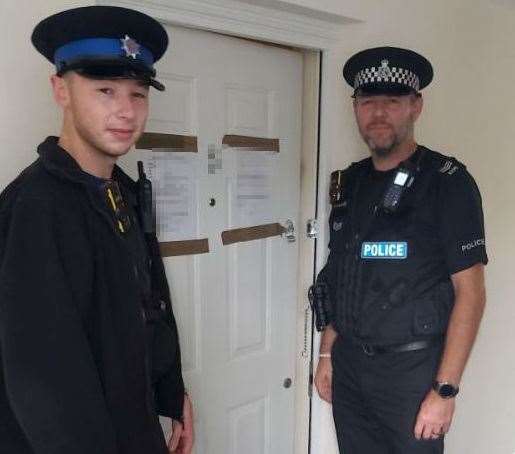 Officers from the Medway Community Safety Unit, PCSO Morgan Mitchell and Sgt Steve Holpin, at the address in Silver Streak Way, Strood which has been closed down following a spate of anti-social behaviour by the occupants. Picture: Kent Police
