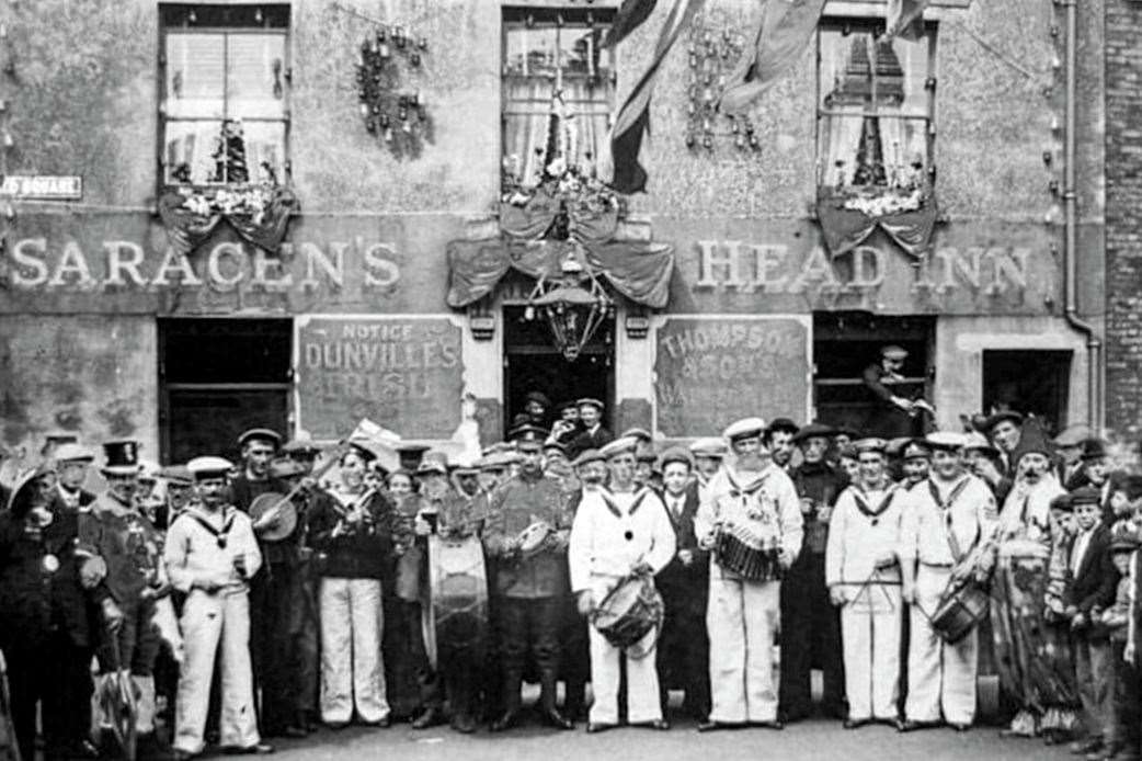 Celebrating Armistice Day in 1918 at the Saracens Head, in Deal. Picture supplied by Rory Kehoe/Paul Skelton/dover-kent.com