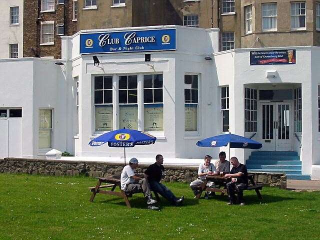 Drinkers enjoying the sun outside the old Club Caprice in Cliftonville