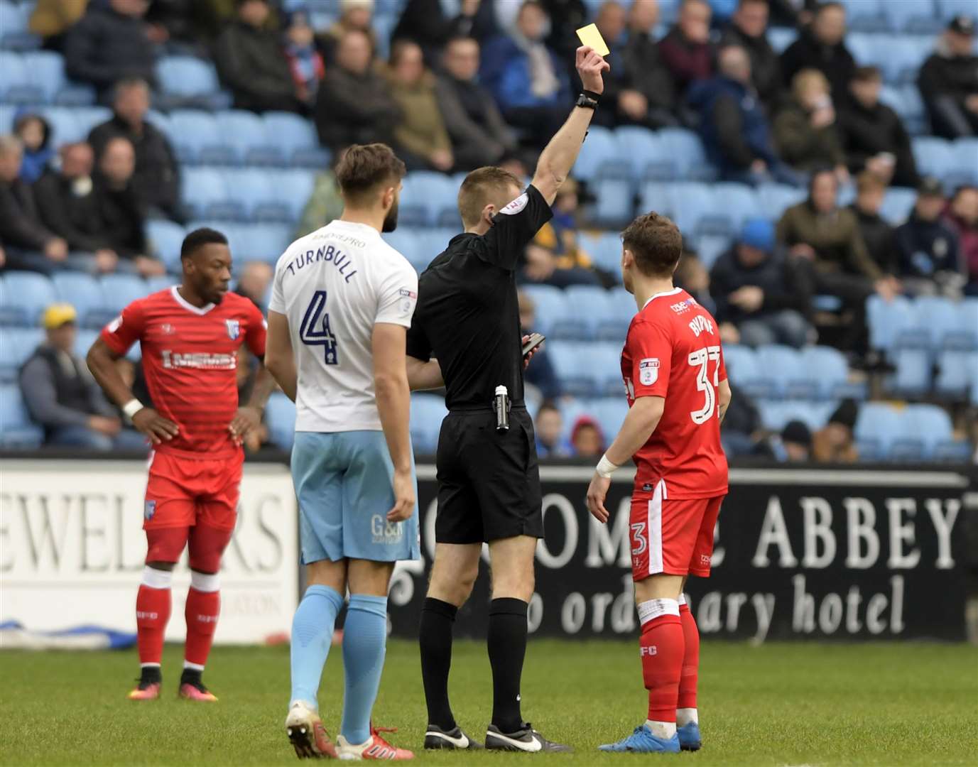 Mark Byrne is booked by referee Michael Salisbury at Coventry last year Picture: Barry Goodwin