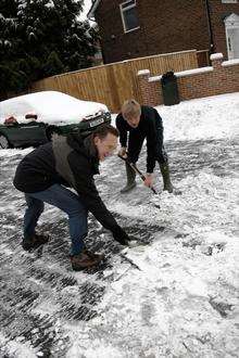 Steve Kennard and Rob Baker cleared Hempstead Road of snow and ice themselves.