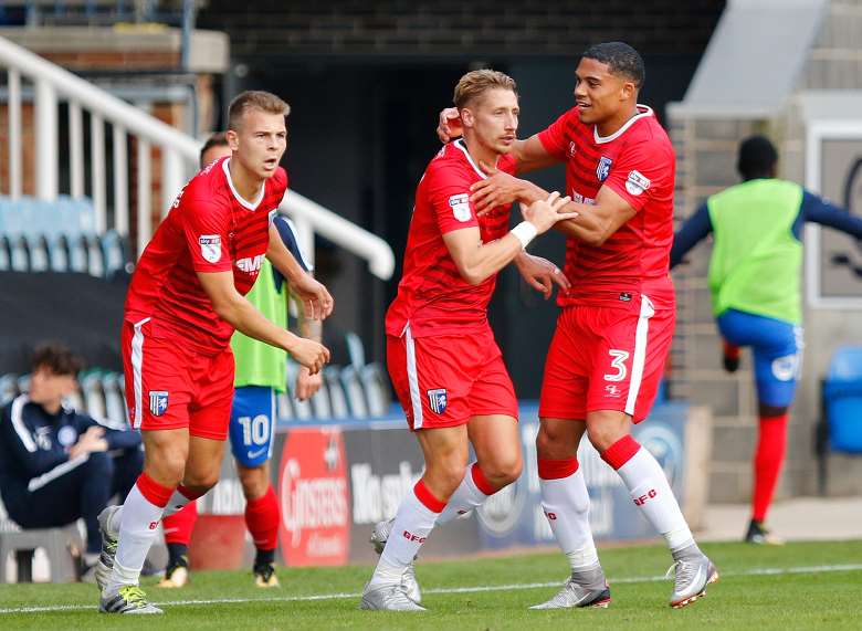 Lee Martin congratulated after scoring for Gills Picture: Andy Jones