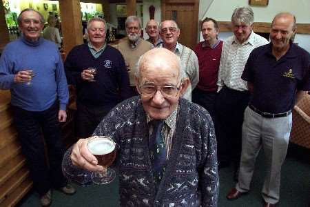 TOP MAN: Bim Smith and friends celebrate his hole-in-one at the 19th hole. Picture: RICHARD EATON