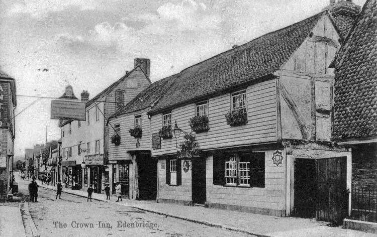 Crown Inn in Edenbridge with its distinctive sign across the high street in 1909. Picture: Mark Jennings