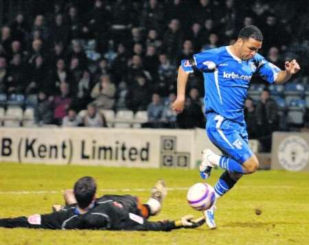 Andy Barcham scores Gillingham's third goal at Priestfield on Tuesday night. Picture: Grant Falvey
