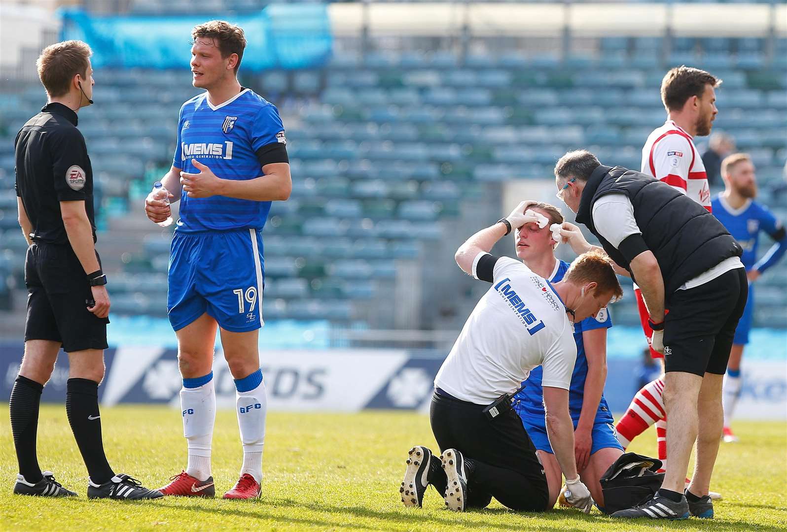 Tom Eaves gets treatment for a head injury against Doncaster. Picture: Andy Jones