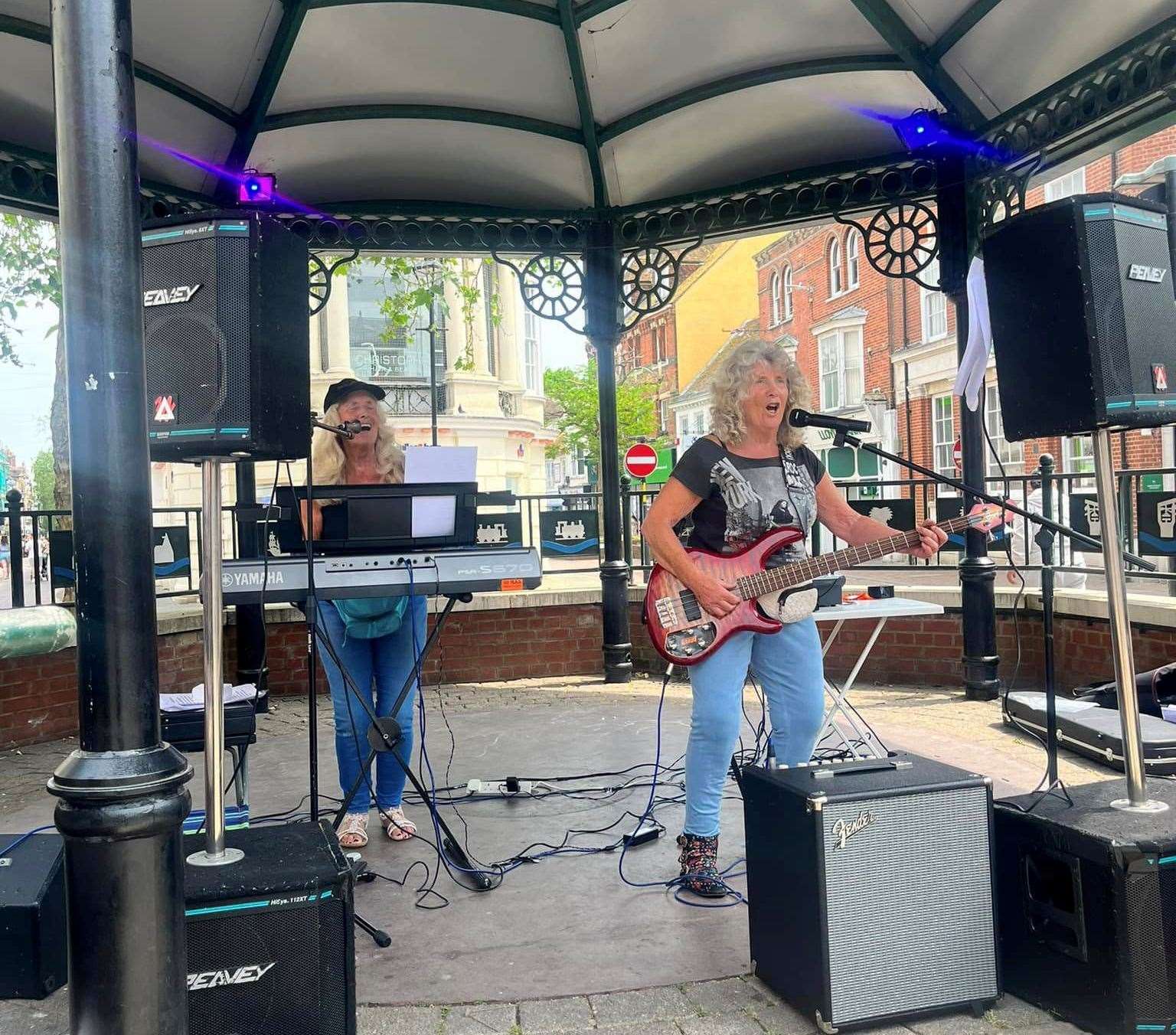 Patricia and Margaret performing at the bandstand in Ashford town centre earlier this month