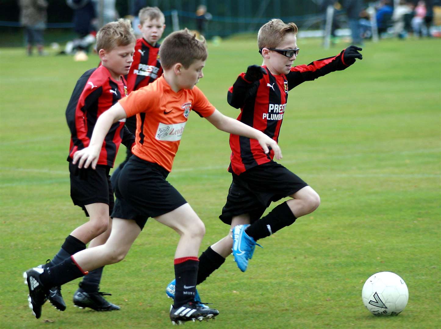 Lordswood Youth under-11s (orange) battle Woodcoombe Youth under-11s for the ball Picture: Phil Lee