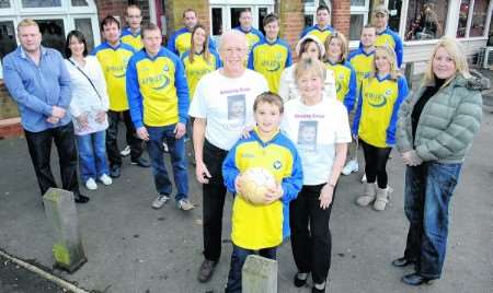 Clive Bradurn with family, friends and regulars who have been raising money for Cosmic